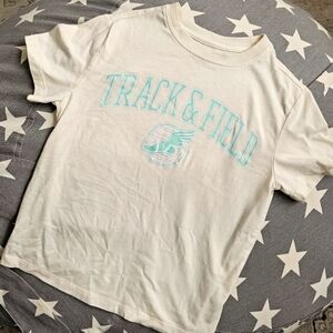 Kids Size 6/7 Track & Field t-shirt Teal and Cream